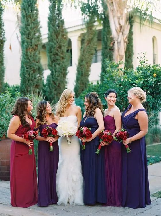 navy, purple, fuchsia and red maxi dresses with mismatched necklines but in the same style