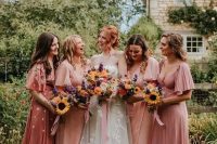 pretty matching pink bridesmaid dresses plus a floral pink bridesmaid dress for a garden wedding