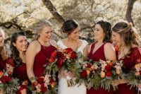 stylish modern burgundy maxi bridesmaid dresses are a perfect idea for a bold fall wedding