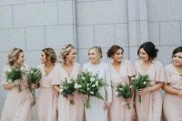 tender blush wrap maxi bridesmaid dresses with high low skirts, V-necklines and short sleeves