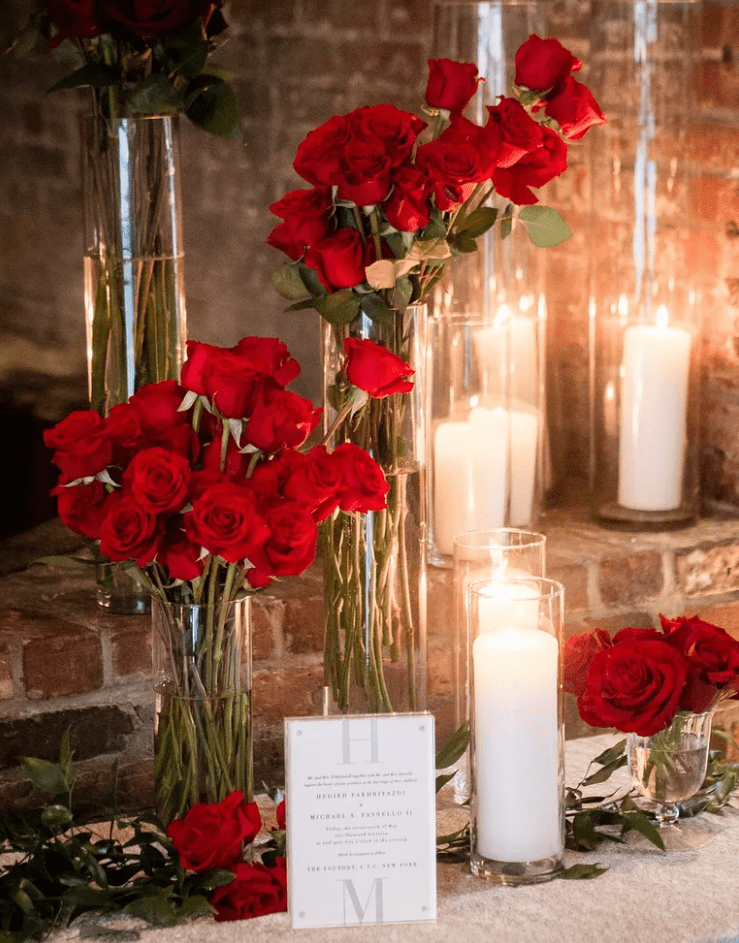 classic red roses with long stems can become simple and refined wedding centerpieces and arrangements