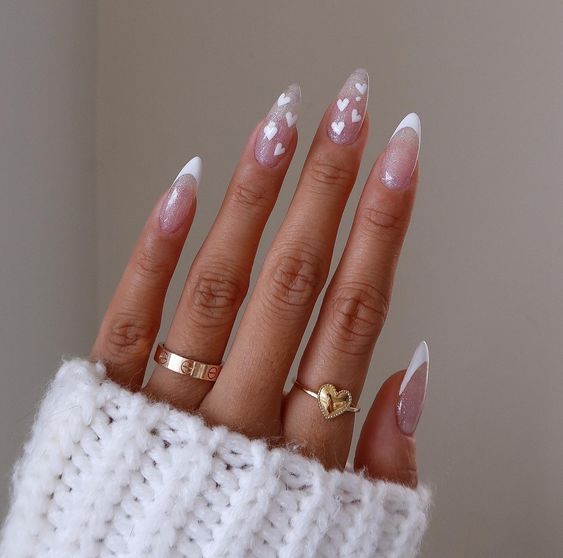 a cute French manicure with heart accent nails is a lovely idea for a cute and lovely bridal look