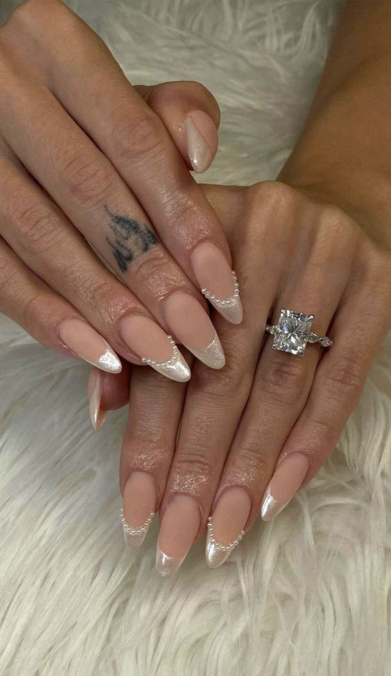 a super glam French bridal manicure with pearly tips, little beads and matte blush is amazing for a wedding