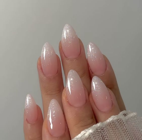 a super glam sparkle ombre French manicure is a lovely and chic solution for a wedding