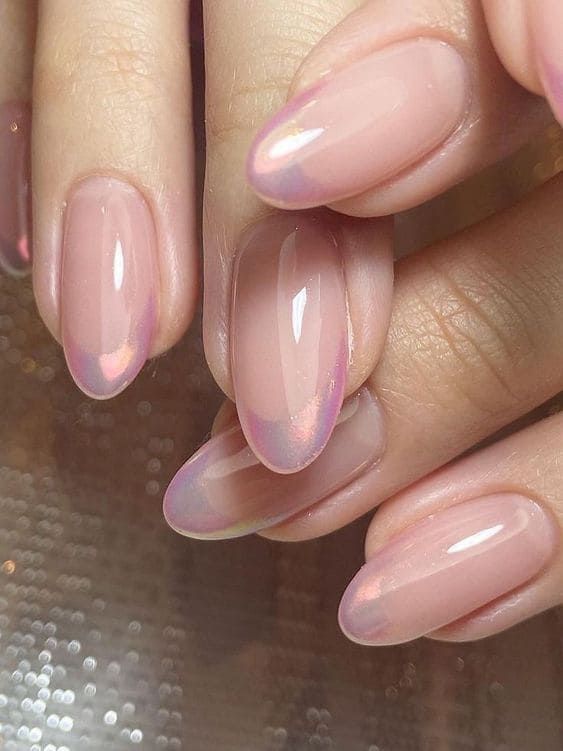 beautiful iridescent French nails are a lovely take on a traditional French manicure, with a girlish touch