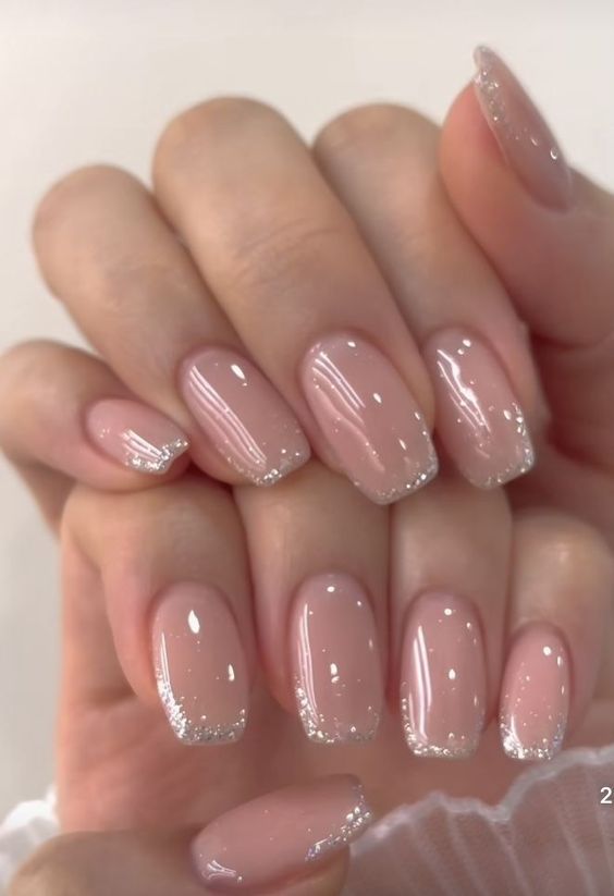 Beautiful square French nails with glitter tips are adorable for a glam bride, they look awesome and very eye catchy