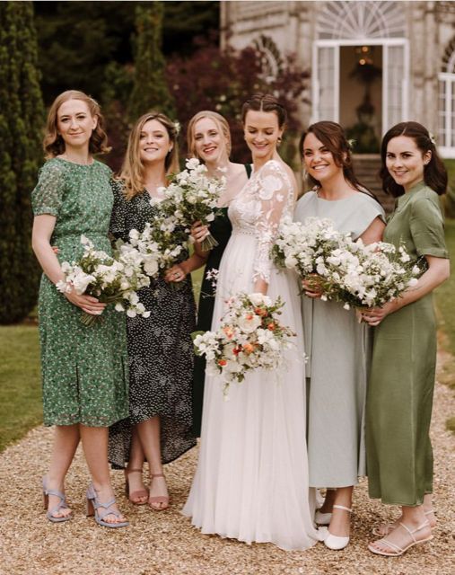 black and green maxi and midi bridesmaid dresses are a lovely idea for a green wedding