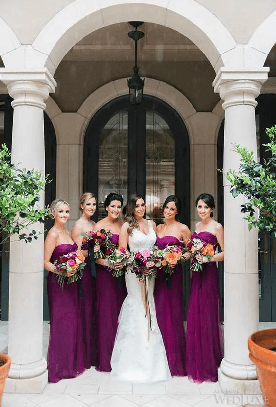 bold purple strapless sweetheart bridesmaids’ dresses are amazing for a bold summer or fall wedding with purple in the color scheme