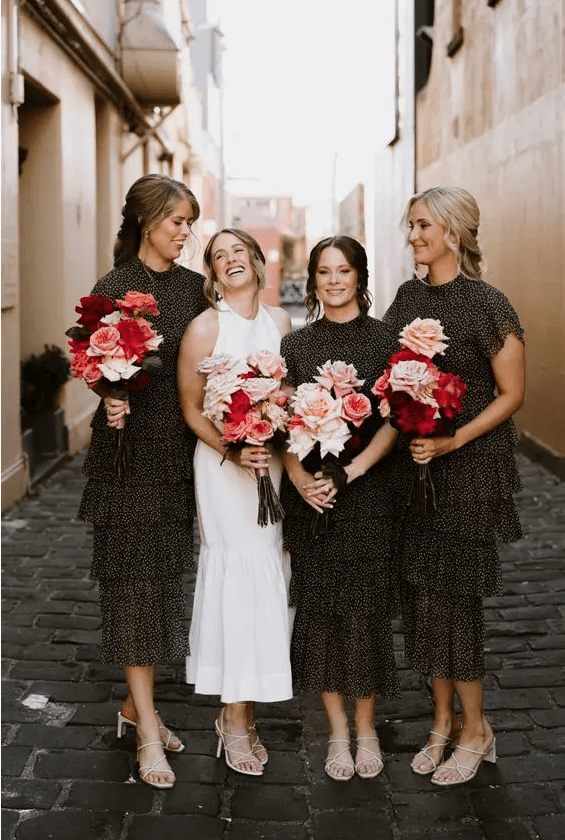 creative midi black ruffle bridesmaid dresses with high necklines and short sleeves, white strappy shoes and bold bouquets are amazing
