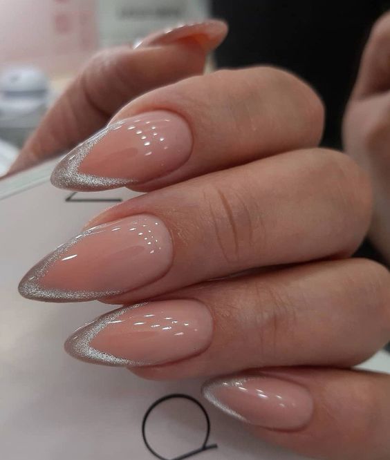 long pointed nails with silver velvet tips are amazing for a wedding, they show off a bold trend