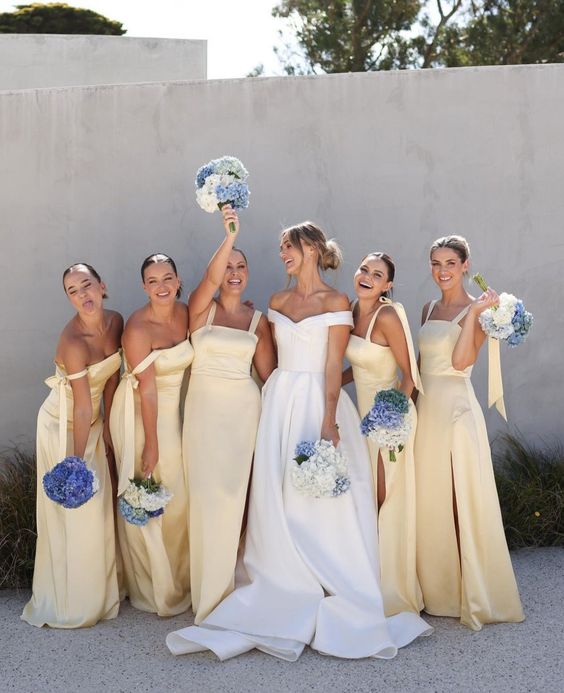 lovely light yellow off the shoulder maxi bridesmaid dresses are a cool solution for a spring or summer wedding