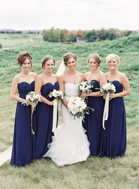 matching strapless maxi bridesmaid dresses with draped bodices are a great idea for an elegant wedding