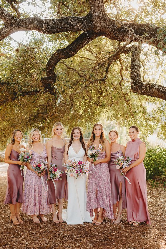 Mauve and pink solid color and polka dot midi and maxi bridesmaid dresses for a pink infused wedding