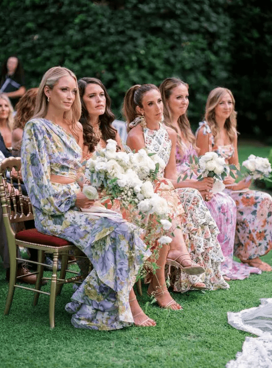 maxi pastel floral bridesmaid dresses with strappy shoes are amazing for a bright and fun summer wedding