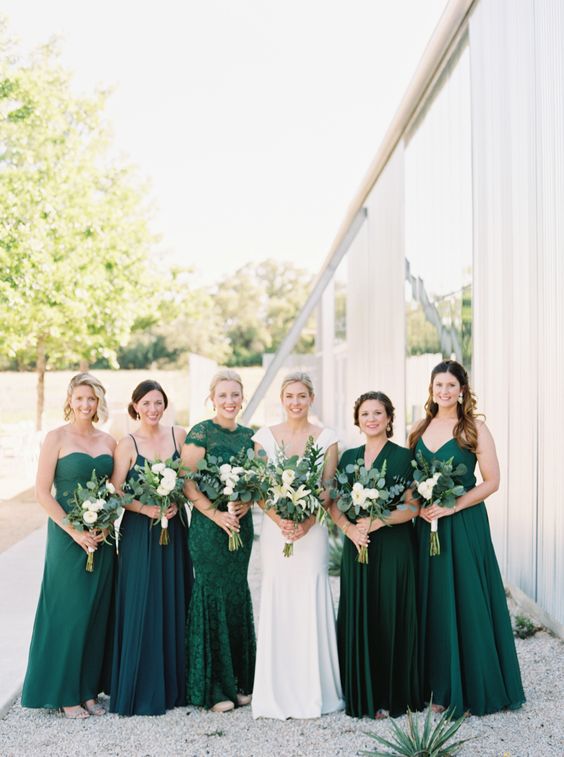 mix and match green and teal strapless maxi bridesmaid dresses of plain fabric and lace for a fall wedding