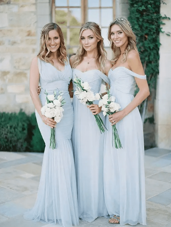 off the shoulder pale blue gowns and a V-neckline mermaid one for the maid of honor are amazing for spring and summer weddings