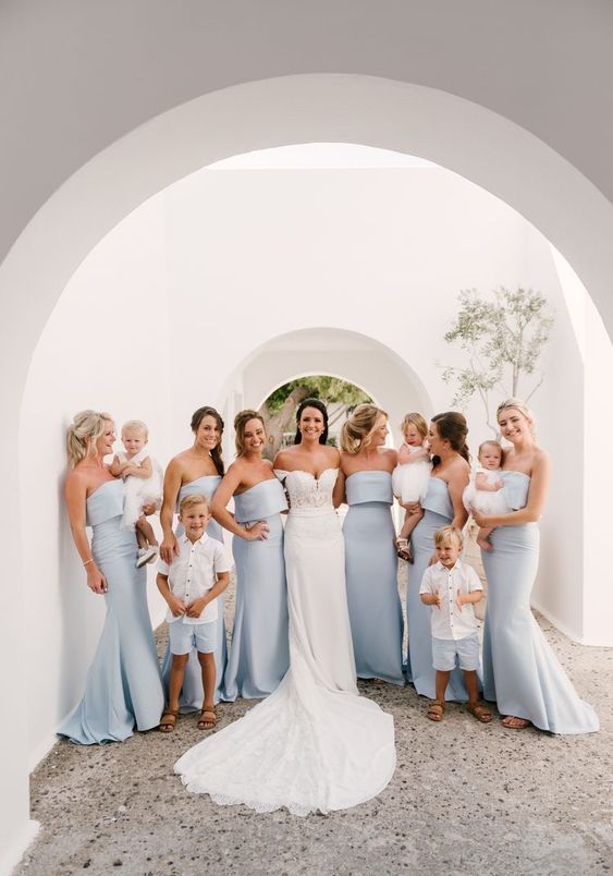 pale blue mermaid strapless bridesmaid dresses are a gerat idea for a beach or ocean wedding