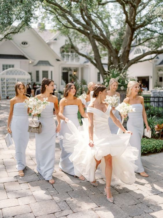 pale blue off the shoulder maxi bridesmaid dresses are a gerat idea for a delicate spring wedding done in pastels or neutrals