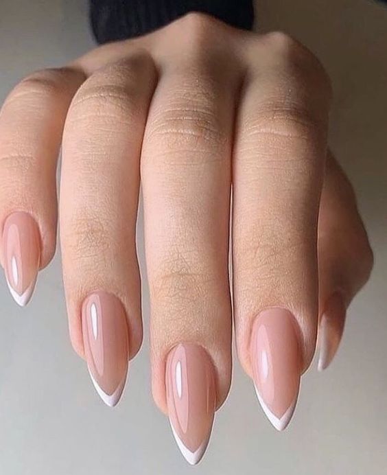 perfect pointed French nails with very thin tips are ideal for a modern bride, minimal French nails are on top