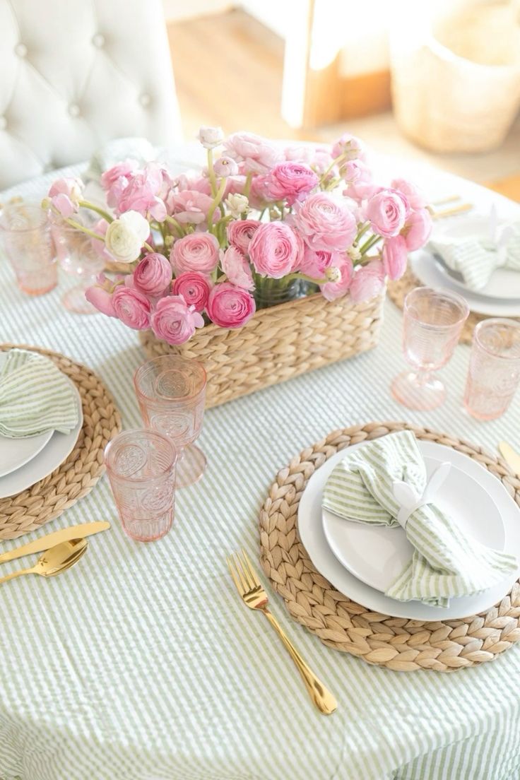 a basket with pink and white ranunculus is a fantastic spring or summer wedding centerpiece you can make