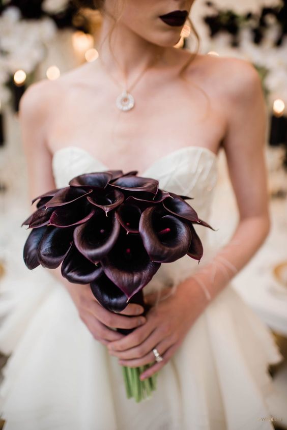a sophisticated deep purple calla wedding bouquet is a perfect solution for a moody or Halloween wedding