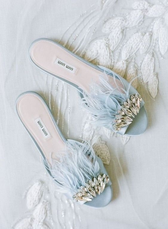 blue embellished slippers with feathers will be a unique addition to any bridal look and your soemthing blue, too