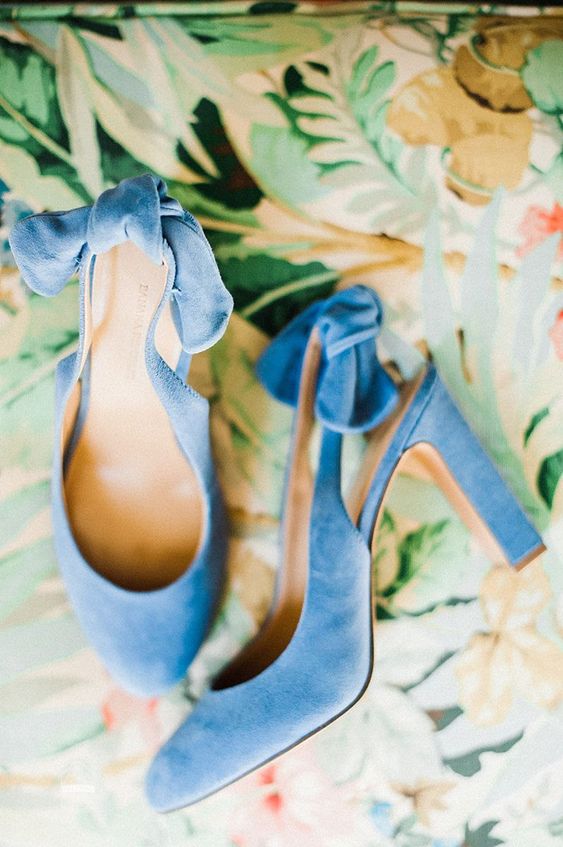 chic blue suede slingbacks with high heels and bows on the backs are amazing for a wedding