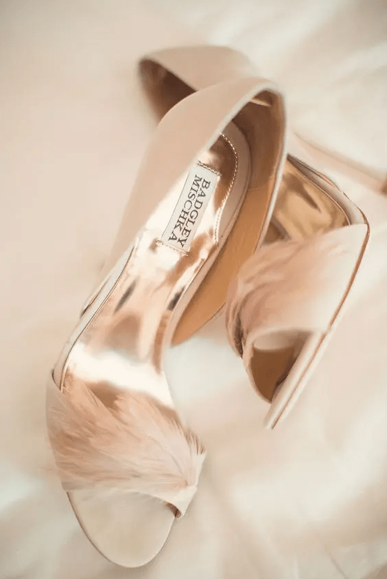 chic blush feather shoes are a whimsy and cute touch to any bridal look, especially a bold glam one
