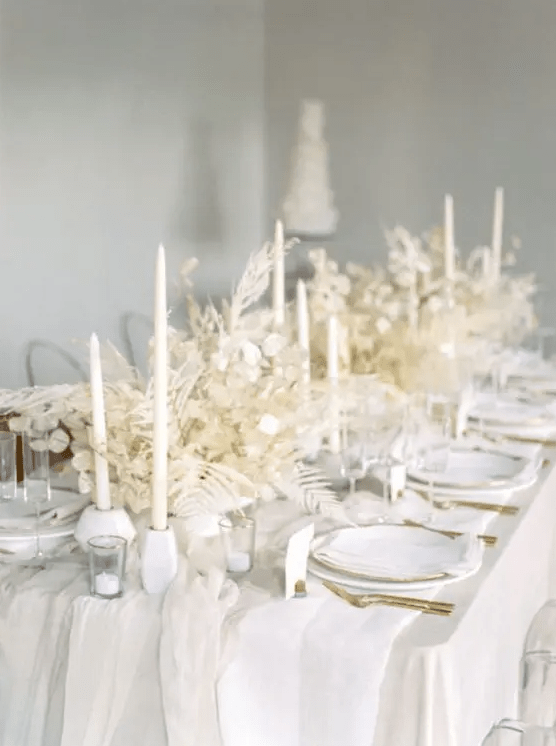 fabulous bleached wedding centerpiece of lunaria, ferns and grasses are amazing to make your wedding tablescape ary and ethereal