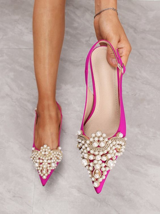 hot pink pointed toe wedding slingbacks with pearls all over the tops are amazing for a bold and refined bridal look