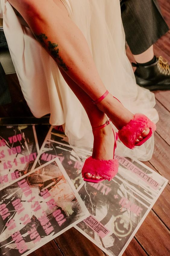 hot pink wedding shoes with faux fur and ankle straps are totally amazing for a bright and fun bridal look