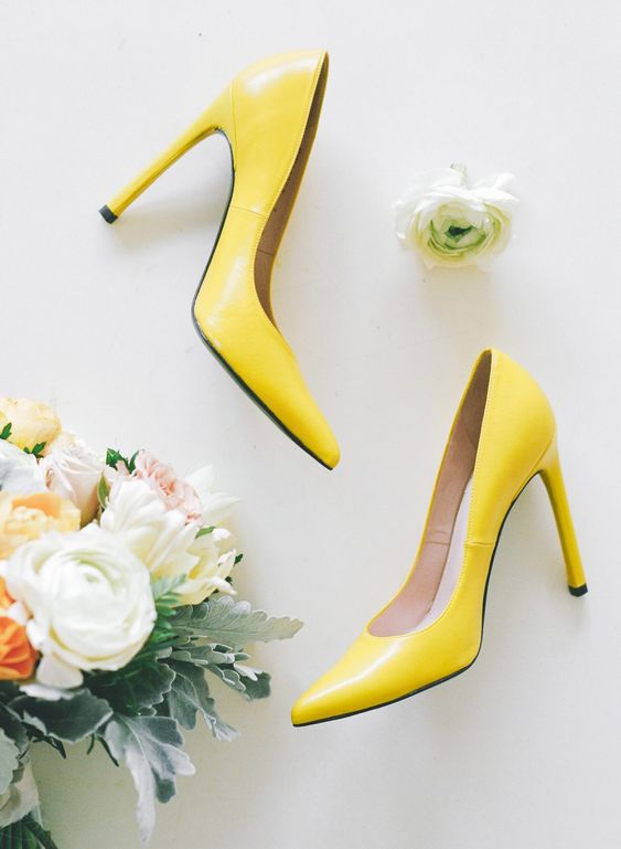 lemon yellow shoes with high heels are a cool idea and you may wear them afterwards with many outfits