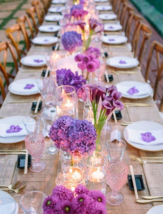 lovely purple wedding centerpieces of mums, hydrangeas and callas are amazing for a purple-infused wedding, in spring or summer