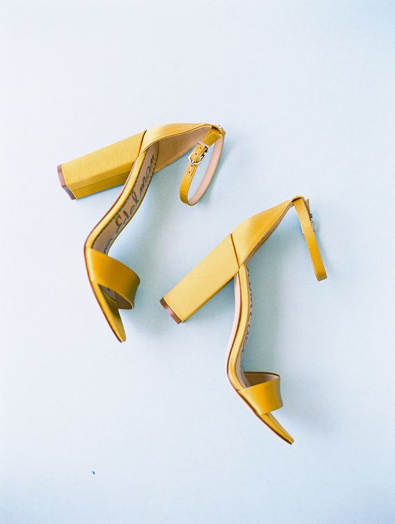 minimalist yellow shoes with block heels and ankle straps will work for many bridal looks and in many seasons