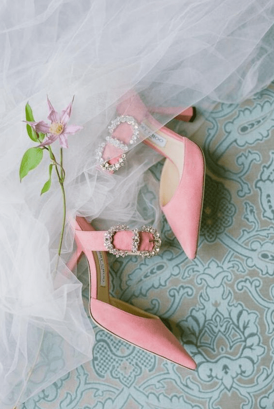 pink wedding mules with pointed toes and straps with embellished buckles are amazing for any bridal look