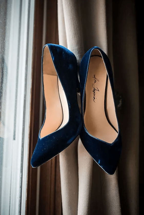 refined navy velvet heels with pointed toes are a gorgeous addition to a fall or winter bridal look, they are gorgeous