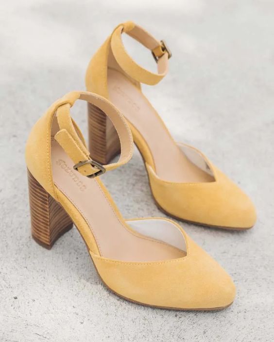 Retro inspired yellow suede shoes with block heels and ankle straps are fantastic for spring and summer
