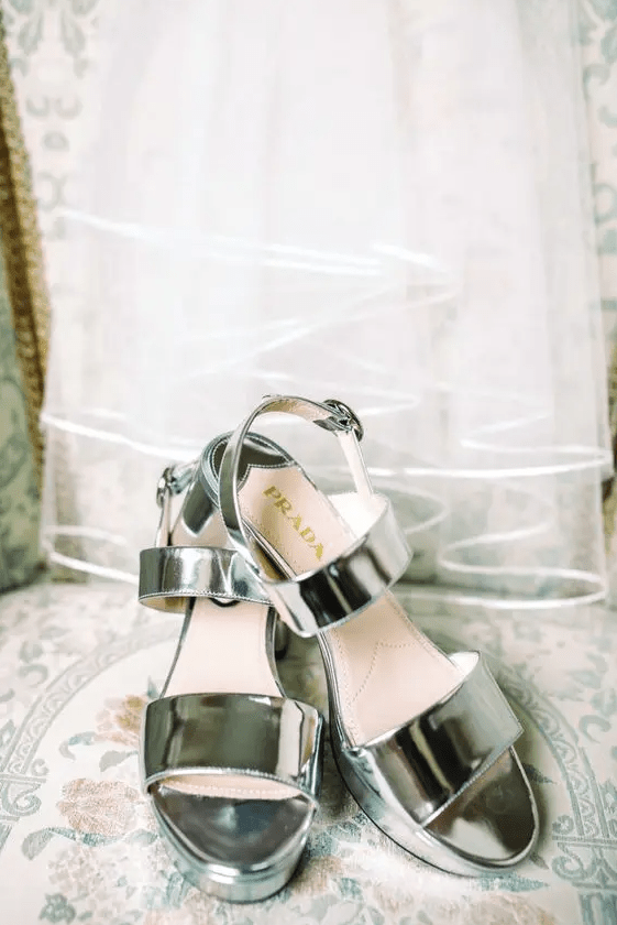 shiny silver strappy platform wedding shoes like these ones are a super trendy and fashionable idea for a modern bride
