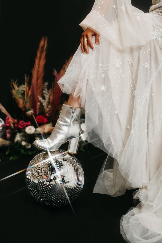 silver wedding boots with comfy block heels are adorable for boho bridal looks, to pull off that 70s vibe