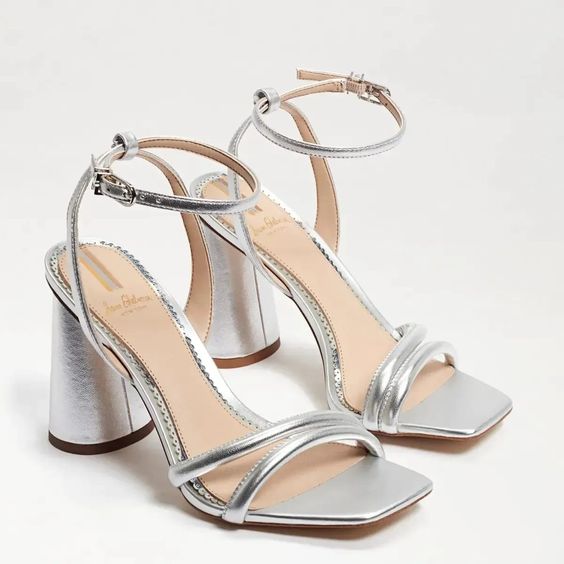 strappy silver wedding shoes with large adn comfy heels are amazing for any bridal look, they look edgy and chic