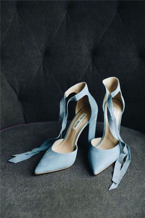 stylish pastel blue wedding shoes with pointed toes, high heels and straps to knot or lace up