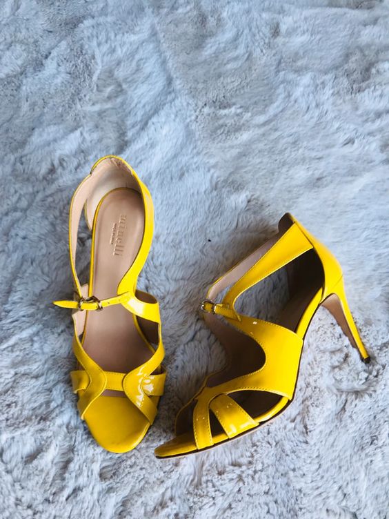 Whimsical lacquer yelow cutout shoes with high heels for a bold and eye catchy look