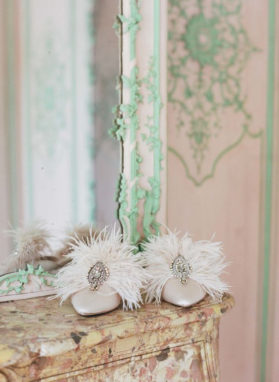 white mules with embellishments and feathers are amazing for a refined and fab bridal look
