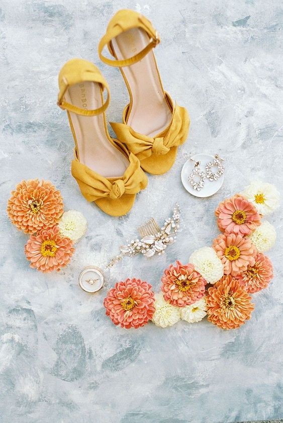 yellow wedding shoes with knotted bows and ankle straps are adorable for spring and summer bridal looks