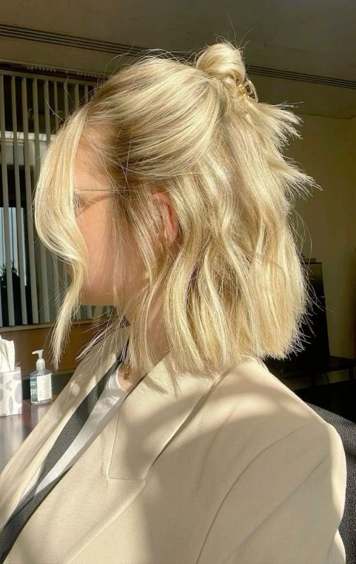 a casual short half updo with a bump, a top knot, face-framing hair and textural hair down will work for a casual wedding