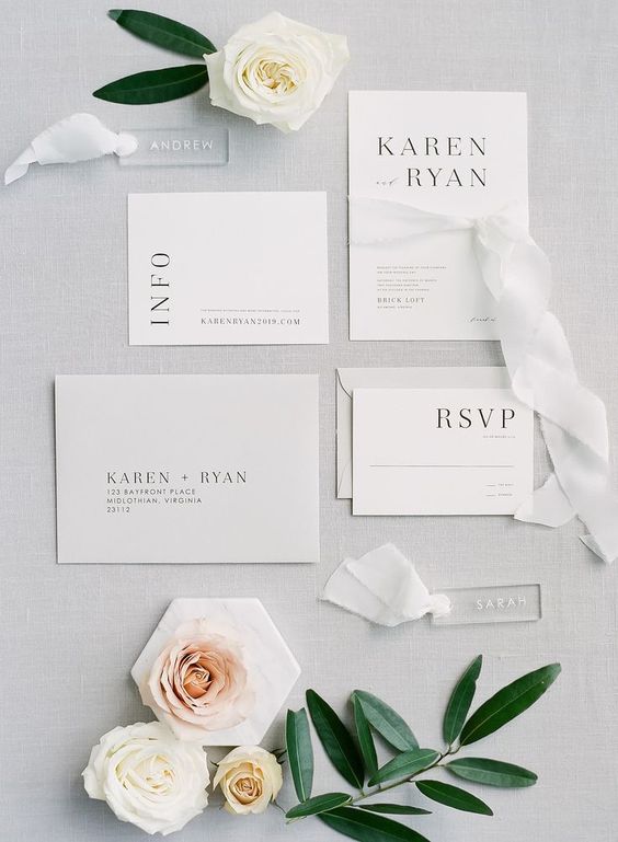 a chic modern wedding invitation suite with black letters is a cool idea for a modern neutral wedding