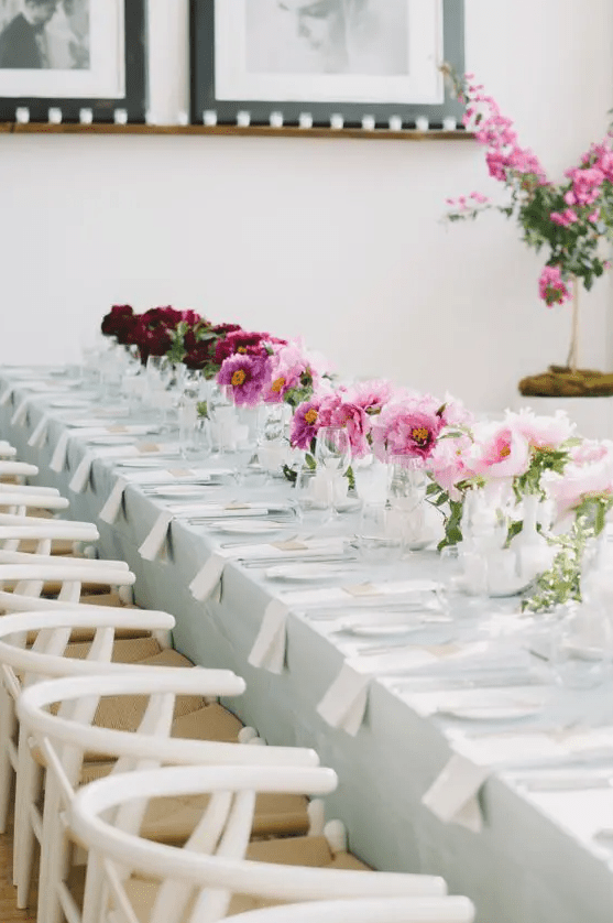 Beautiful wedding table styling with ombre florals   from light pink to hot pink and burgundy is a lovely and bold idea
