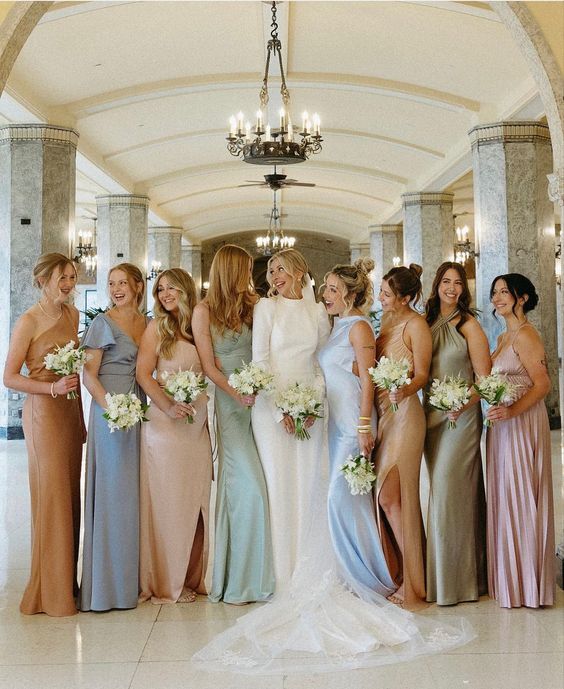 elegant mismathcing pastel maxi bridesmaid dresses are a cool idea for a spring, offer your gals various colors