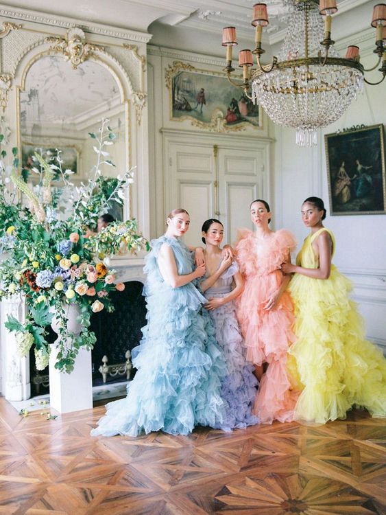jaw-dropping pastel ruffle maxi dresses in yellow, pink, lilac and blue are a fantastic statement for a spring wedding