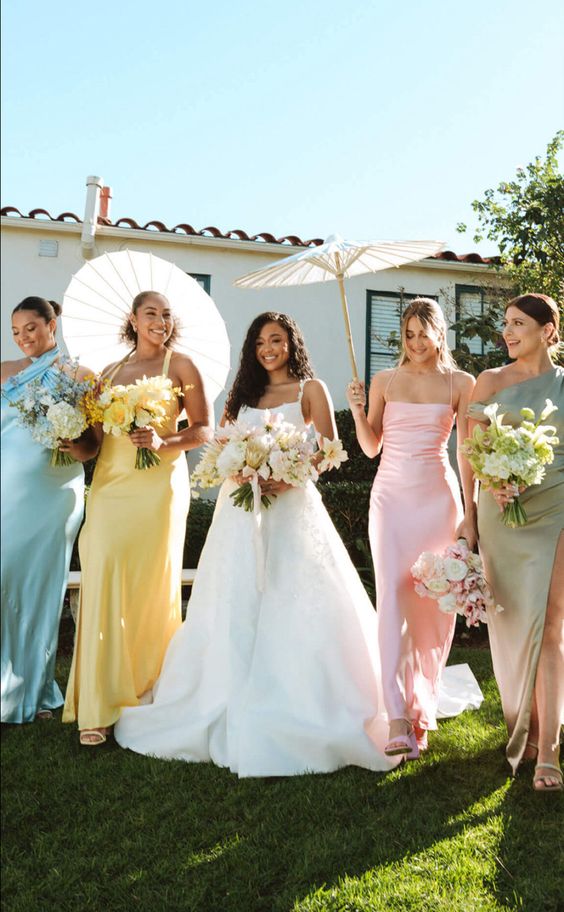 lovely pastel maxi bridesmaid dresses with mismatching and modern designs are adorable for a spring or summer wedding